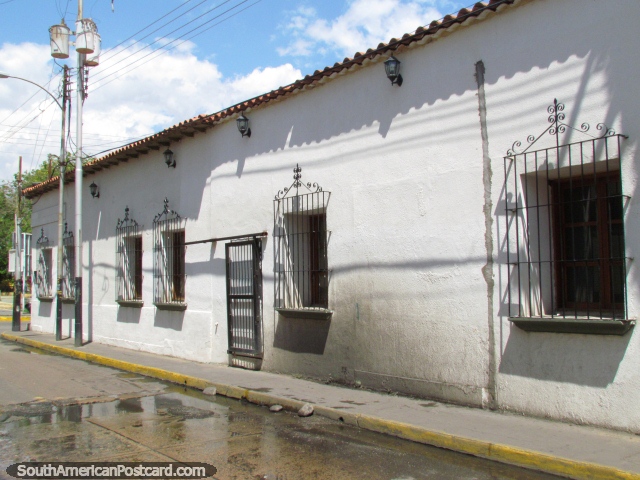 An old white building on an historical street in Barcelona. (640x480px). Venezuela, South America.