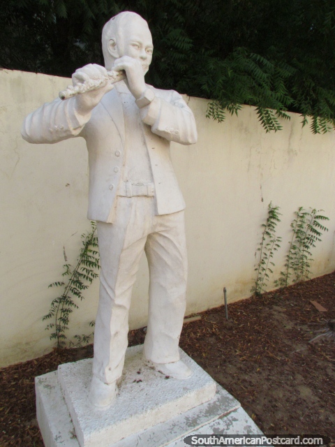Local musician of Coro - Ciro Elvin Trejo Ruiz (1957-1975), statue playing flute. (480x640px). Venezuela, South America.