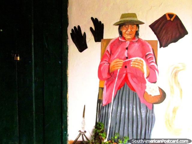 Mujeres Tejedoras del Paramo, pintura mural de una mujer ms vieja en rosa en Mucuchies. (640x480px). Venezuela, Sudamerica.